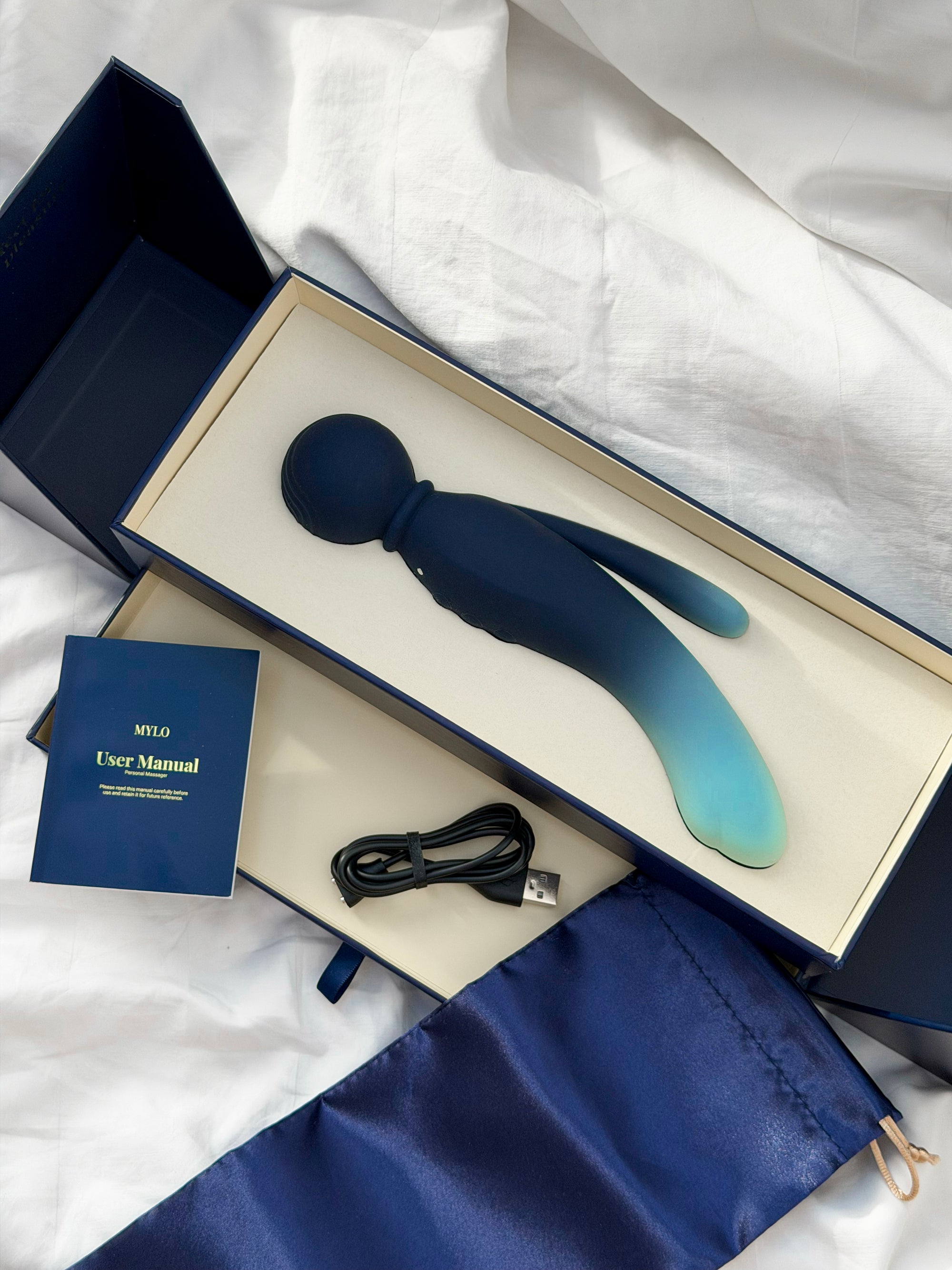 A sleek, gradient blue mylo wand with a smooth silicone finish and ergonomic design.